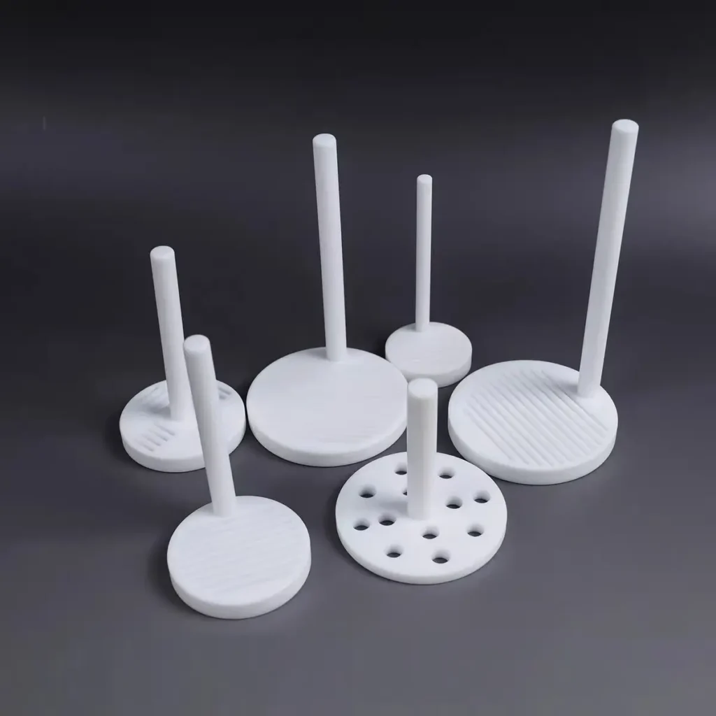 Ultra-high purity PTFE wafer cleaning holder for semiconductor acid etching processes.