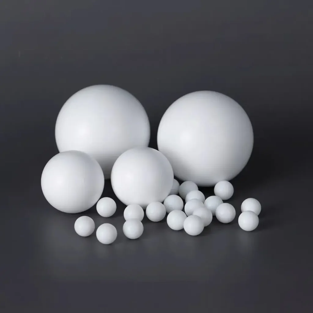 High-precision solid PTFE balls for industrial valve and pump applications, manufactured by HT Fluorotec